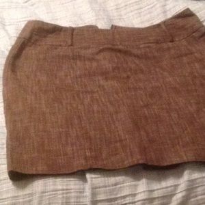 Brown skirt with cute button detail in the back
